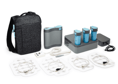 Optune Lua portable cancer treatment device with user interface and medical symbols